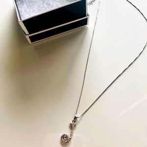 Sterling silver ‘J’ charm with chain.